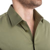 Green button-up shirt with built-in support looks sharp and feels comfortable all day.