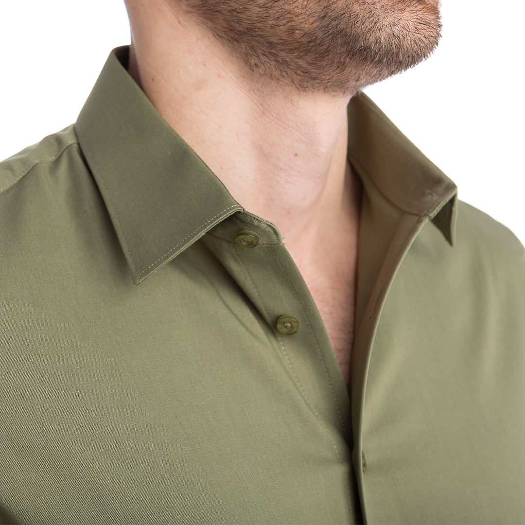 Green button-up shirt with built-in support looks sharp and feels comfortable all day.